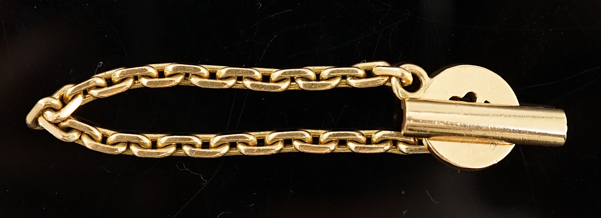 A French Cartier 18ct gold key chain